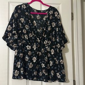 Black Floral deep V with elastic band around waist size 2